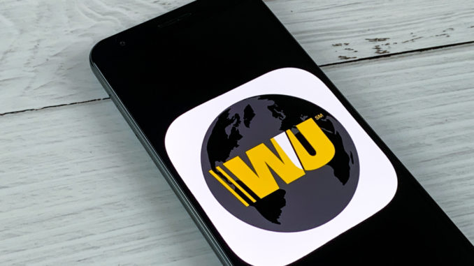 Smartphone,Showing,Western,Union,Application,Logo,On,An,A,Screen.